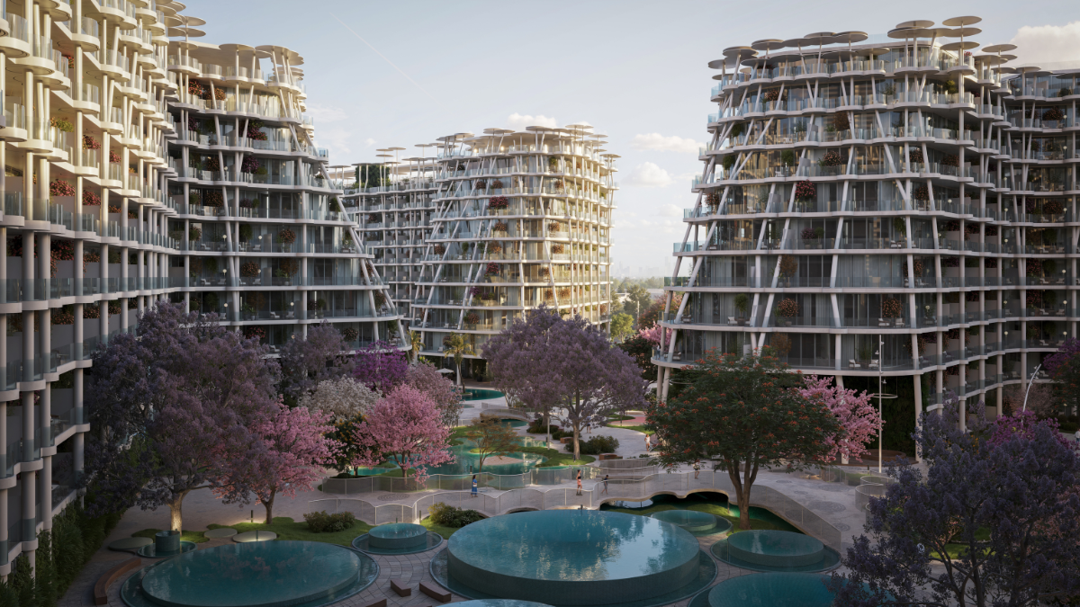 منظر جوي لمشروع سكني على البحيرة في دبي بتصميم معماري مبتكر — Aerial view of a waterfront residential community in Dubai with innovative architecture.